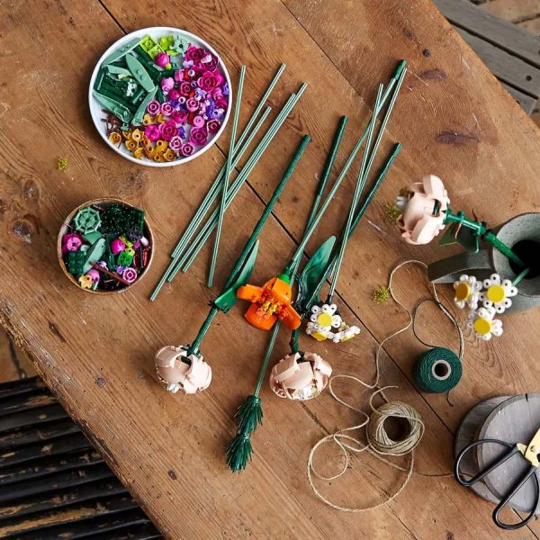 Lego flower bouquet set 10280 - - overhead view of flowers on a table