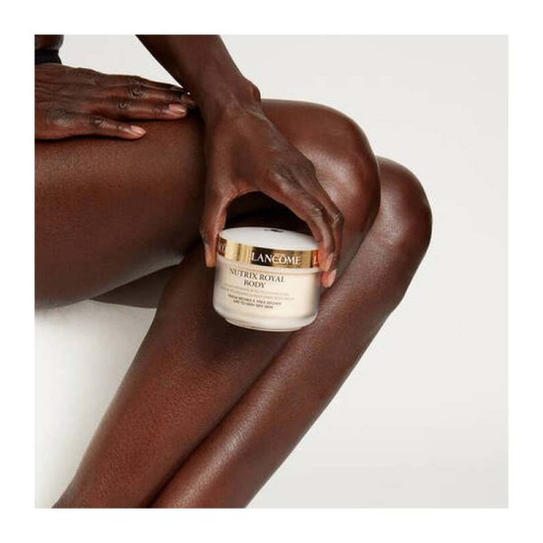 Lancome body butter and beautiful dark skinned model in the background